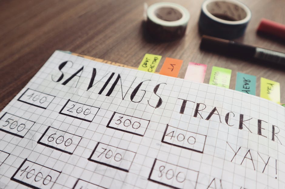 Handwritten savings tracker with financial goals, encouraging smart money management